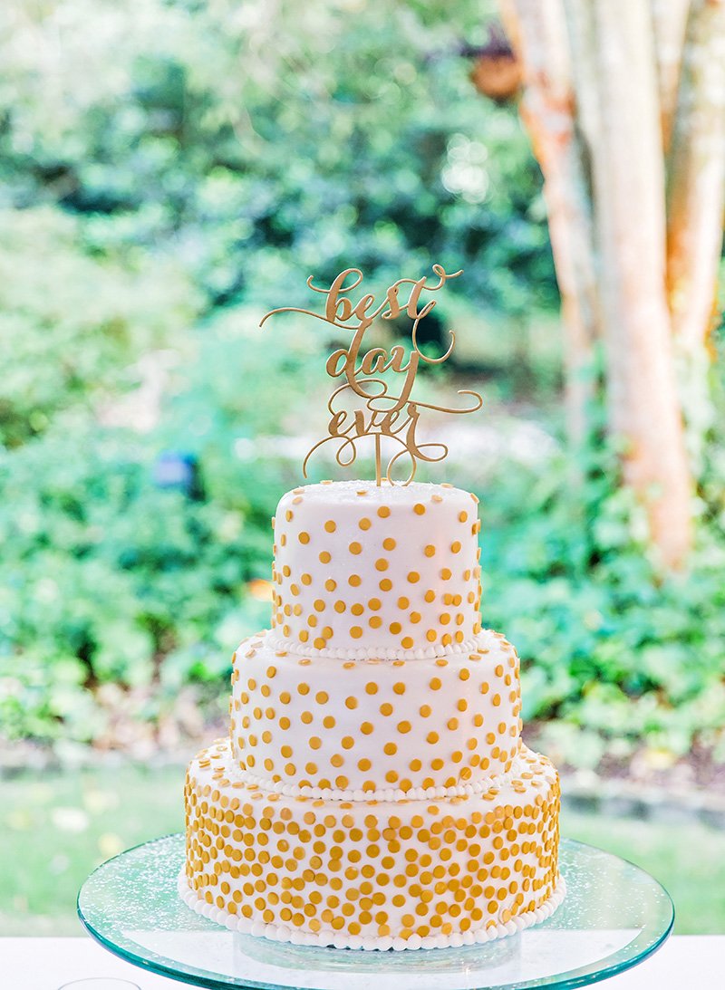 Wedding cake with gold cake topper Charleston wedding photographer Leah Marie Photography + Stationery
