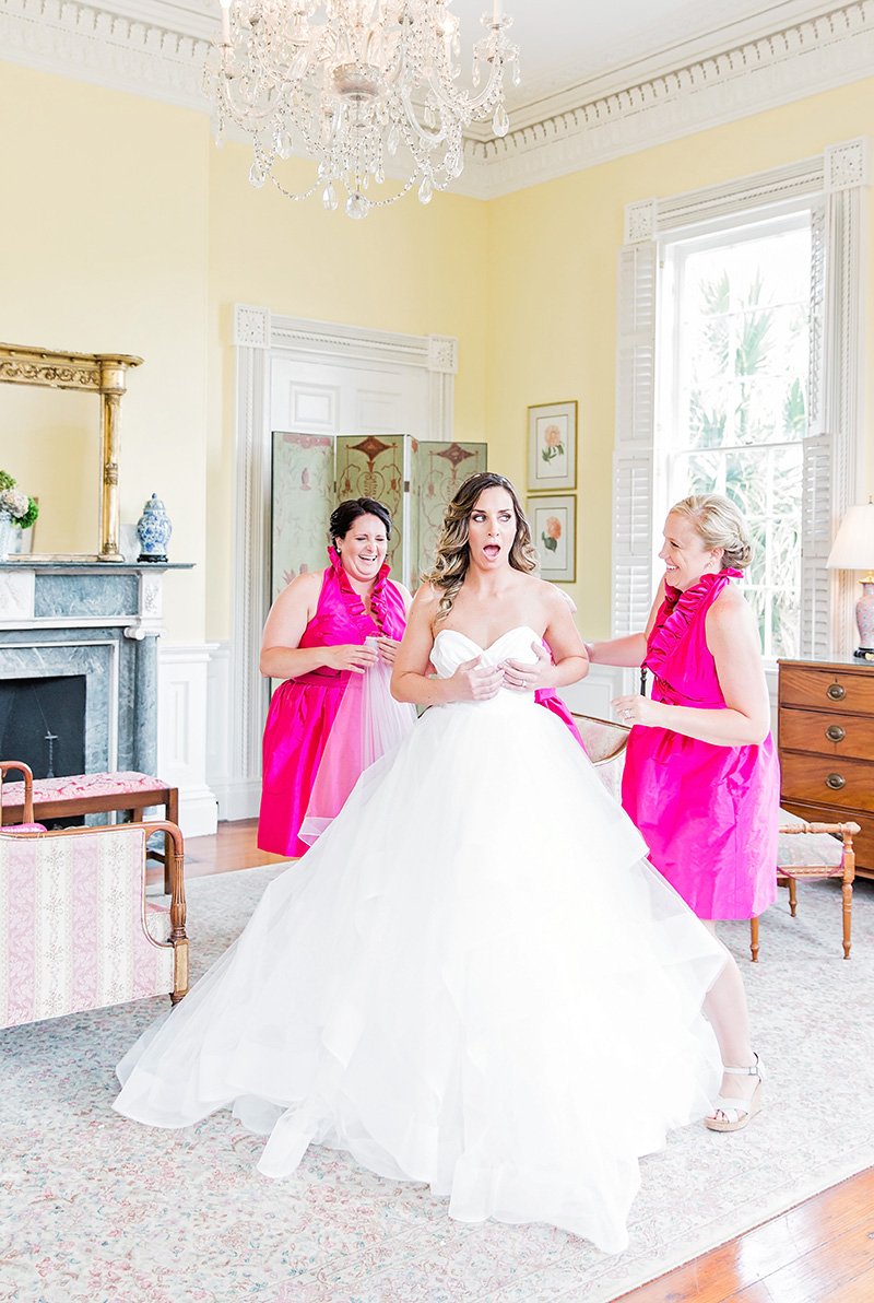 Bride getting ready with bridesmaids at Thomas Bennett House in Charleston Charleston wedding photographer Leah Marie Photography + Stationery