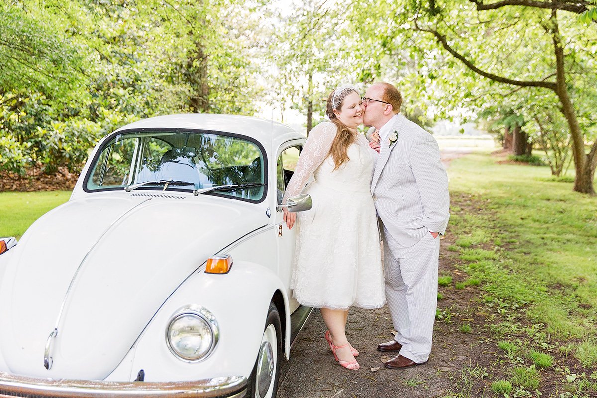 Bride and Groom with Volkswagen at farm wedding