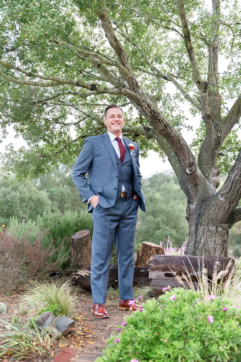 Groom in blue suit San Jose wedding photographer Leah Marie Photography + Stationery