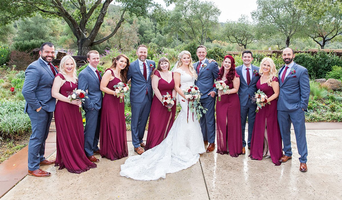 Wedding party in red dresses San Jose wedding photographer Leah Marie Photography + Stationery